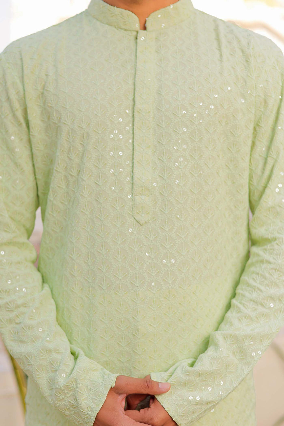 Pista Sequin Embellished Chikankari Kurta Suit.