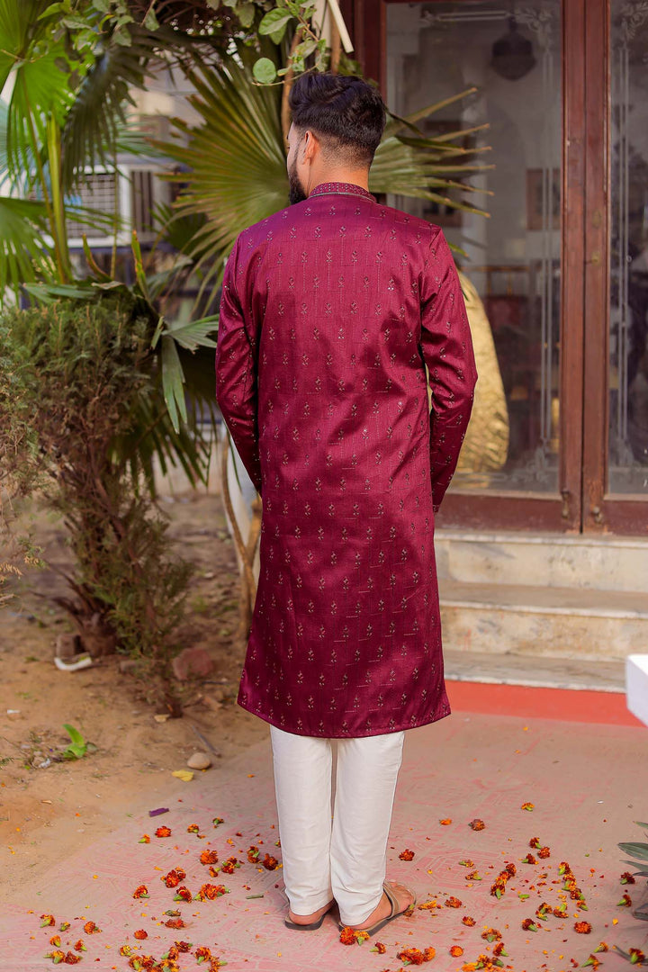 Wine Raw Silk Kurta Suit With Resham Thread And Sequin Embroidery.