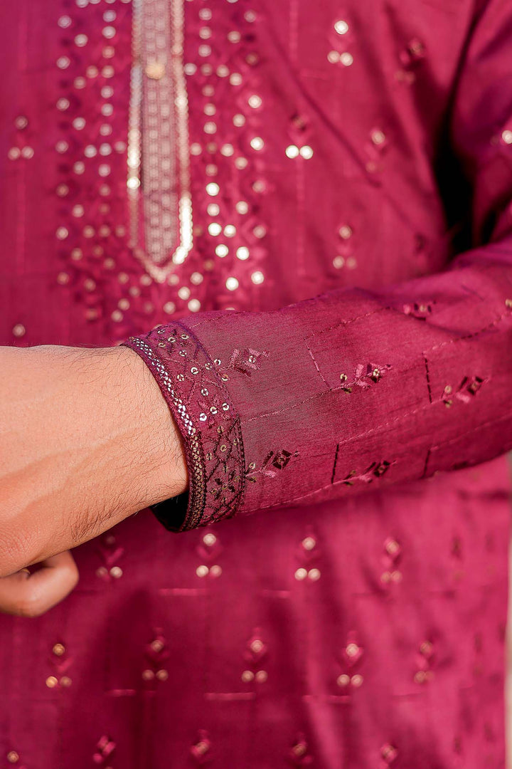 Wine Raw Silk Kurta Suit With Resham Thread And Sequin Embroidery.