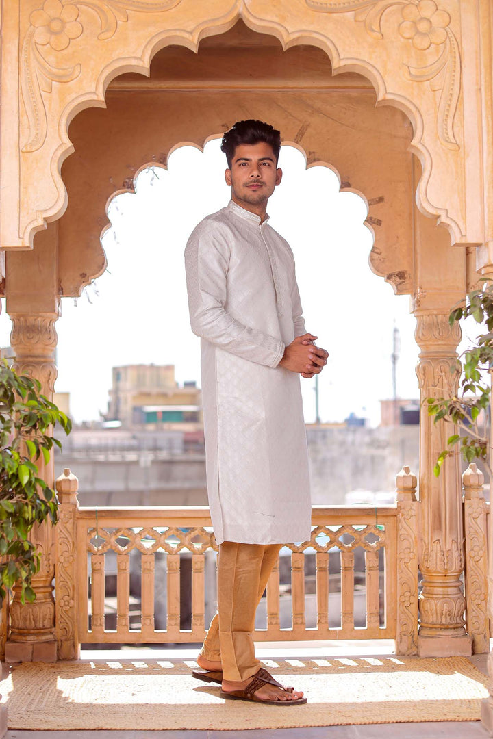 Off White Brocade Silk Kurta Suit With Sequin Thread Embroidery.