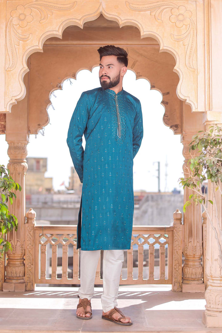 Rama Raw Silk Kurta Suit With Resham Thread And Sequin Embroidery.