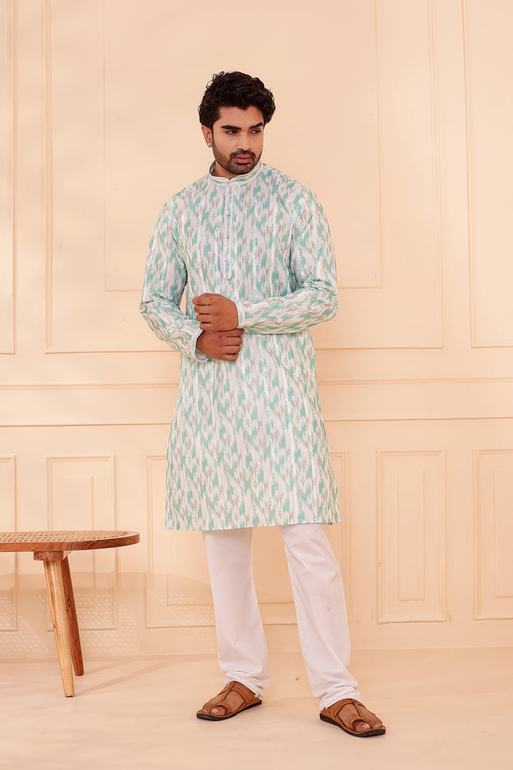 Green Soft Silk Ikat Print Kurta Suit.