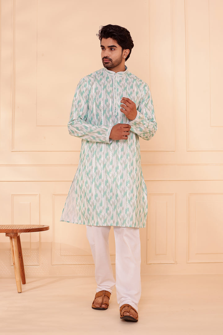 Green Soft Silk Ikat Print Kurta Suit.