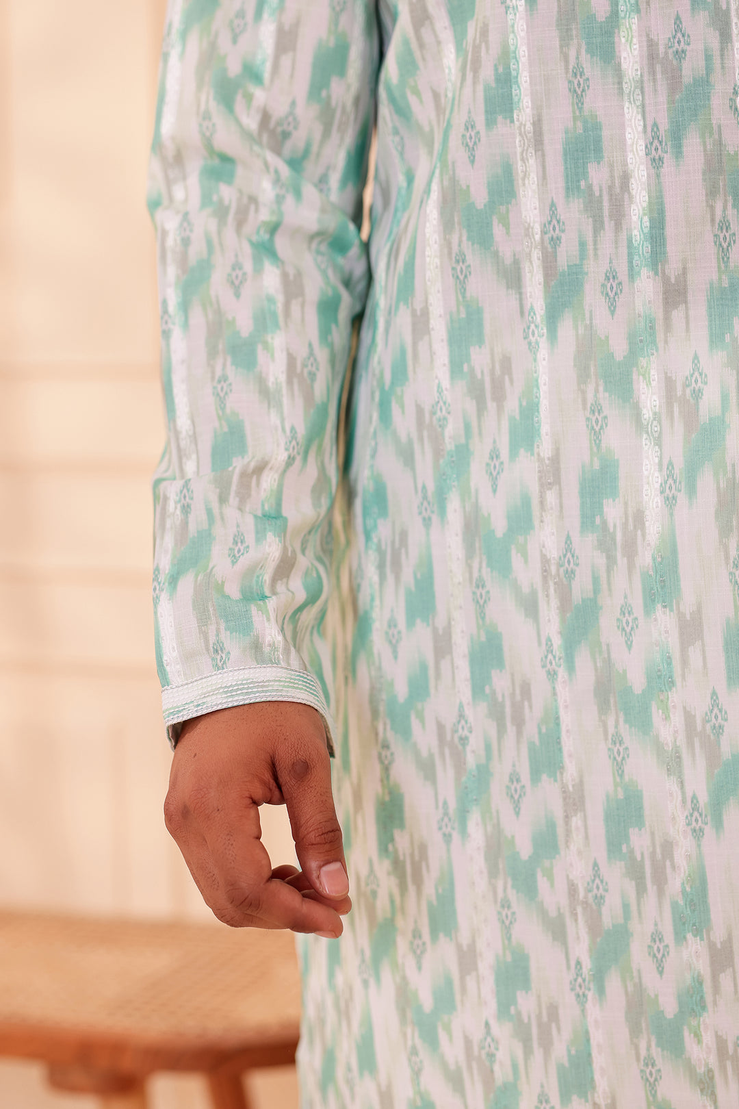 Green Soft Silk Ikat Print Kurta Suit.