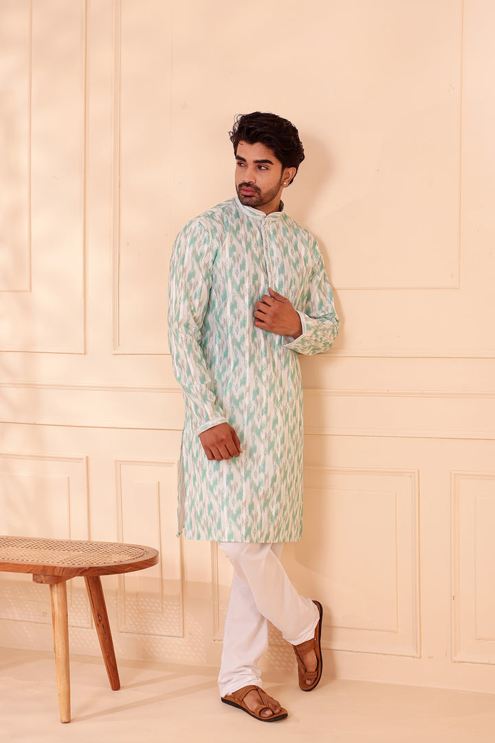Green Soft Silk Ikat Print Kurta Suit.