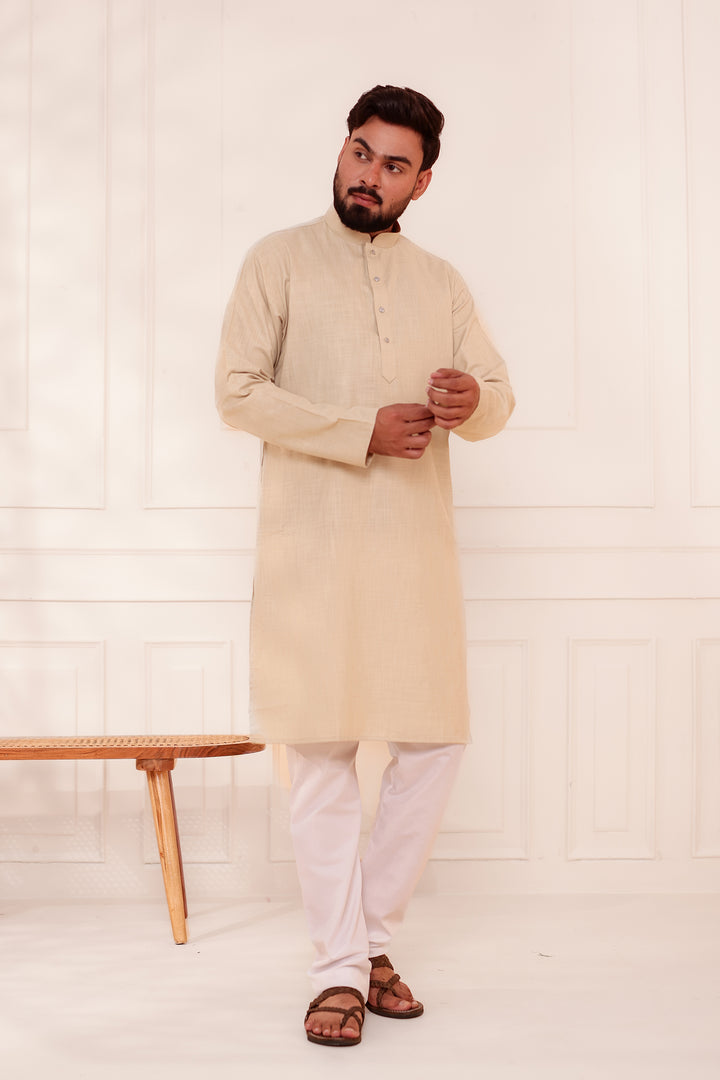 Sandy Soft Cotton-Polyester Kurta Suit.