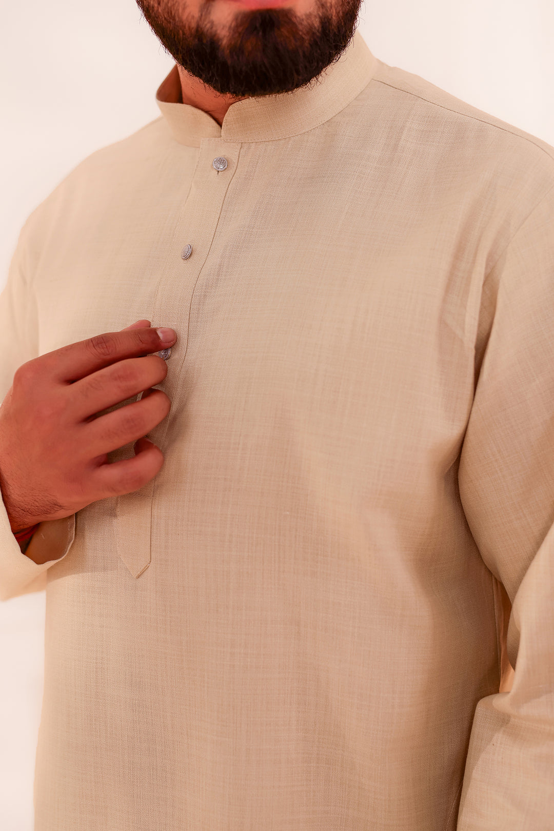Sandy Soft Cotton-Polyester Kurta Suit.