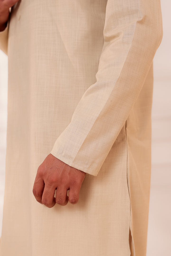 Sandy Soft Cotton-Polyester Kurta Suit.