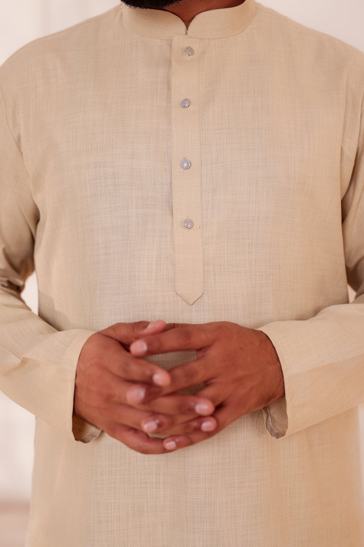 Sandy Soft Cotton-Polyester Kurta Suit.