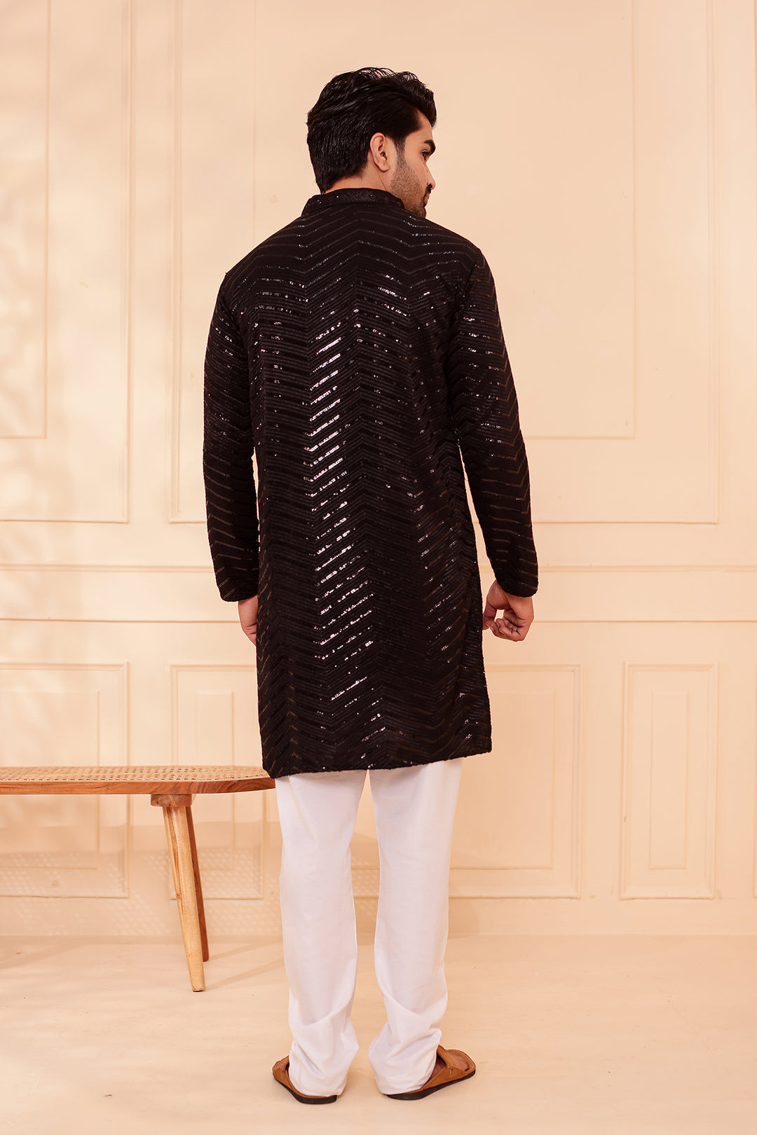 Black Soft Georgette Kurta Suit with Self Thread and Sequin work all over.