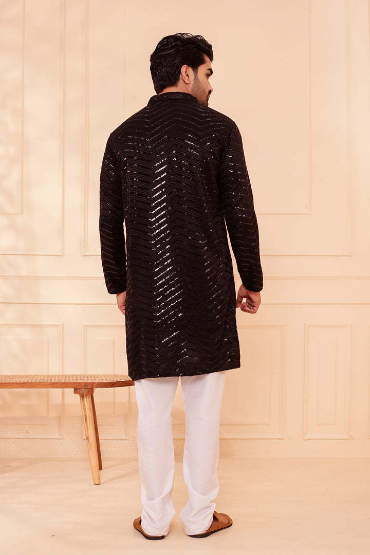 Black Soft Georgette Kurta Suit with Self Thread and Sequin work all over.