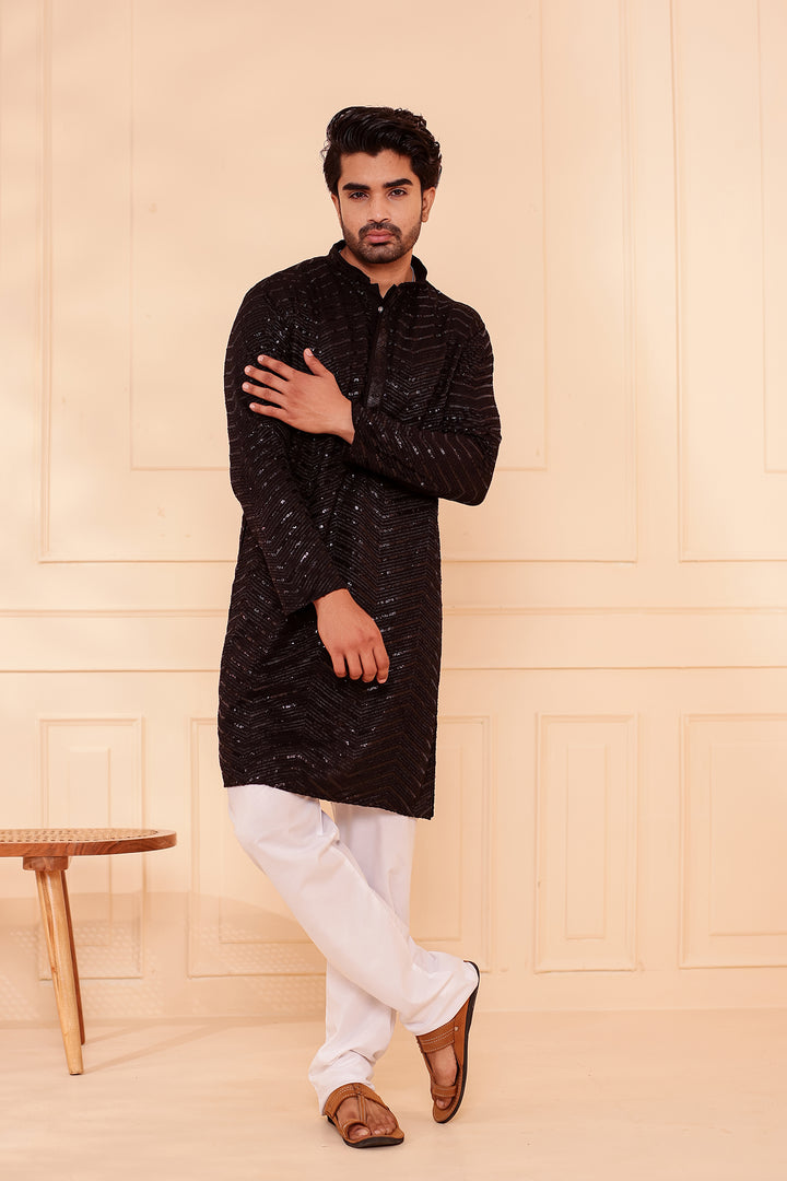 Black Soft Georgette Kurta Suit with Self Thread and Sequin work all over.