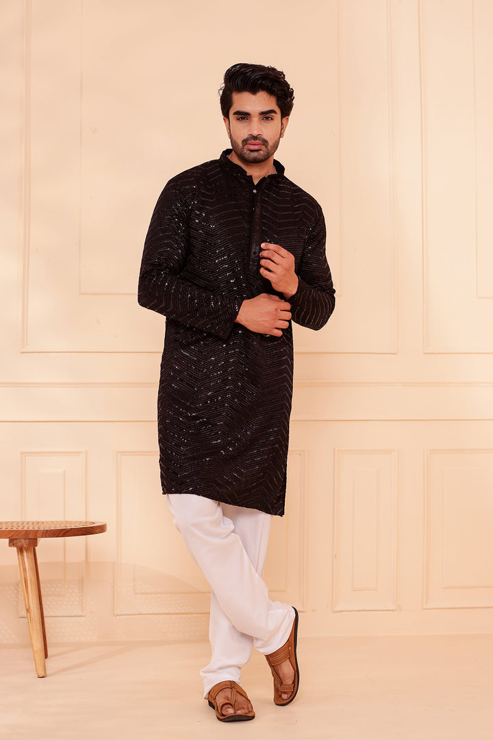Black Soft Georgette Kurta Suit with Self Thread and Sequin work all over.