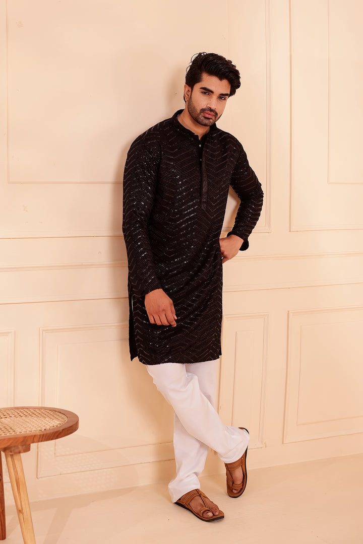 Black Soft Georgette Kurta Suit with Self Thread and Sequin work all over.