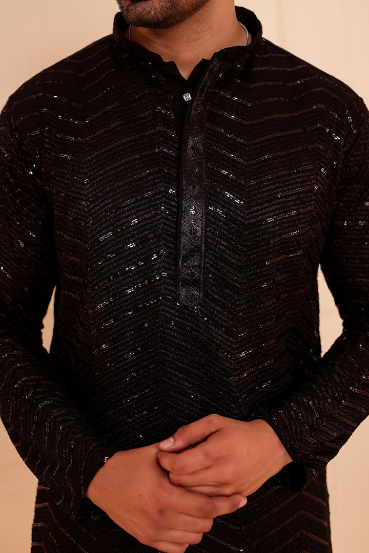 Black Soft Georgette Kurta Suit with Self Thread and Sequin work all over.