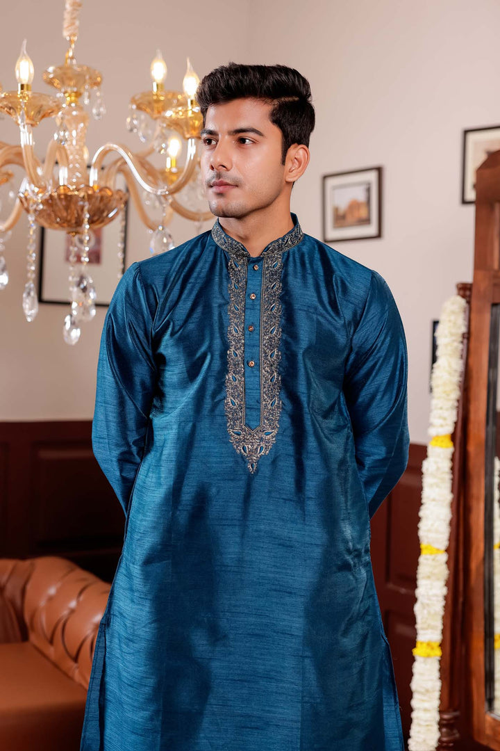 Midnight Blue Raw Silk Kurta Suit with Intricate Embroidery on neckline.