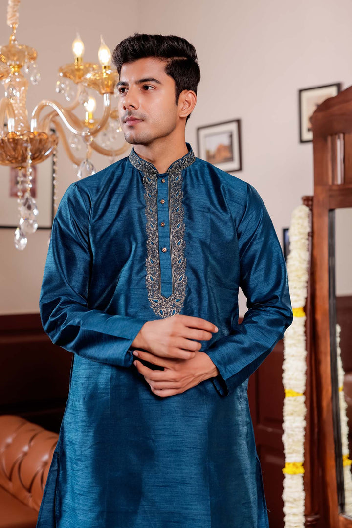 Midnight Blue Raw Silk Kurta Suit with Intricate Embroidery on neckline.