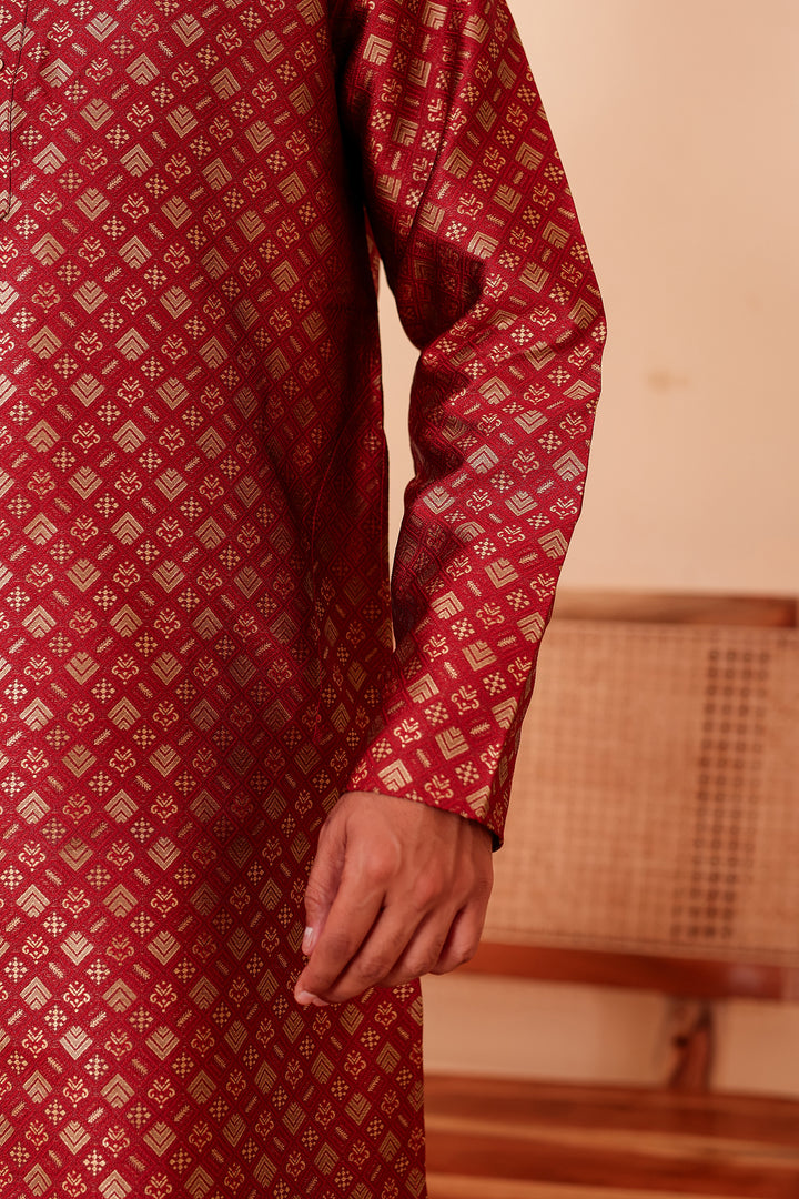 Maroon Brocade Silk Kurta Suit with Gold Zari Weave.