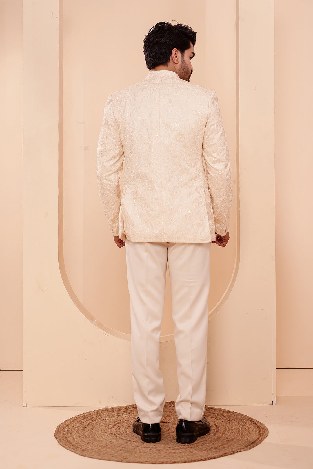 Cream Heavy Embroidered 3pcs Jacket Style Jodhpuri Suit.