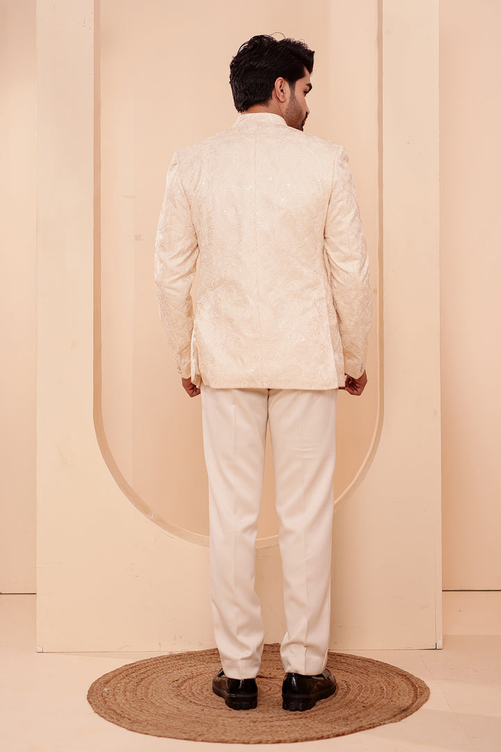 Cream Heavy Embroidered 3pcs Jacket Style Jodhpuri Suit.