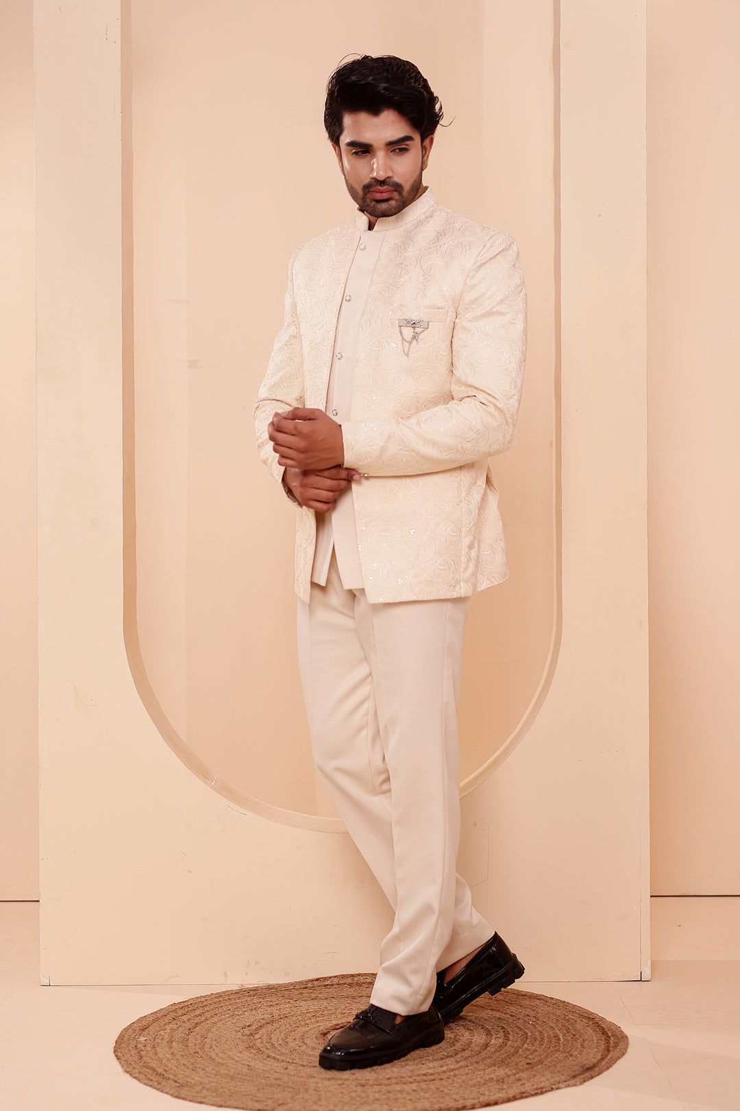 Cream Heavy Embroidered 3pcs Jacket Style Jodhpuri Suit.