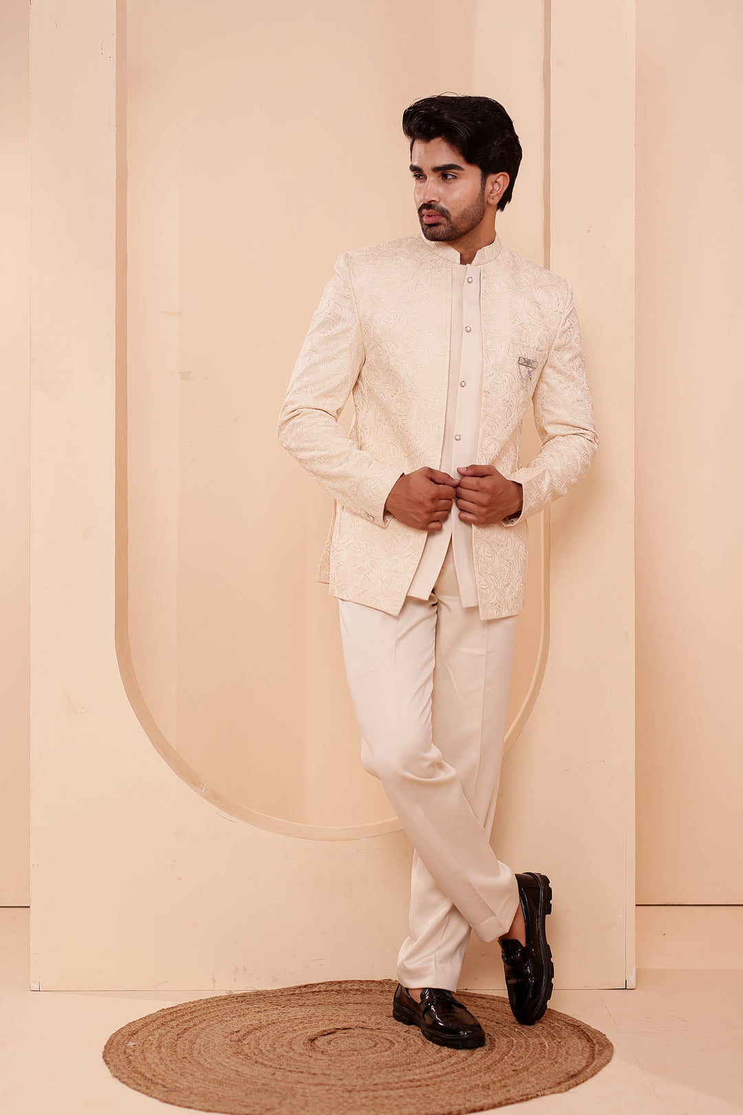 Cream Heavy Embroidered 3pcs Jacket Style Jodhpuri Suit.