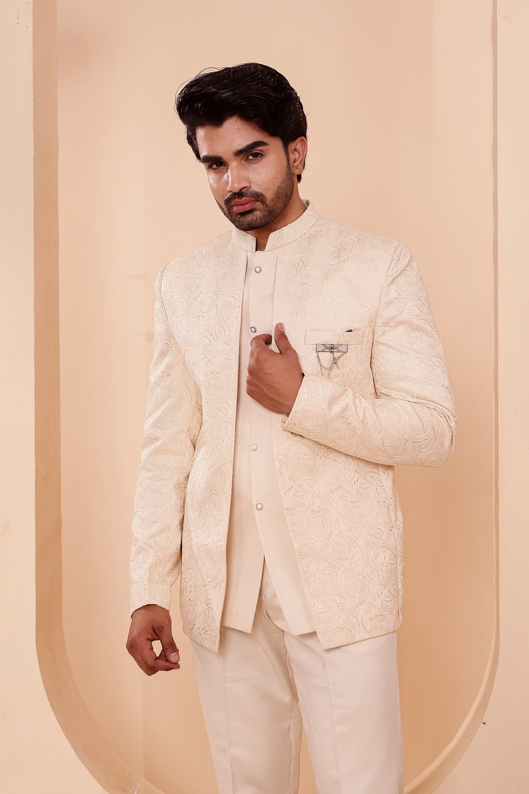 Cream Heavy Embroidered 3pcs Jacket Style Jodhpuri Suit.