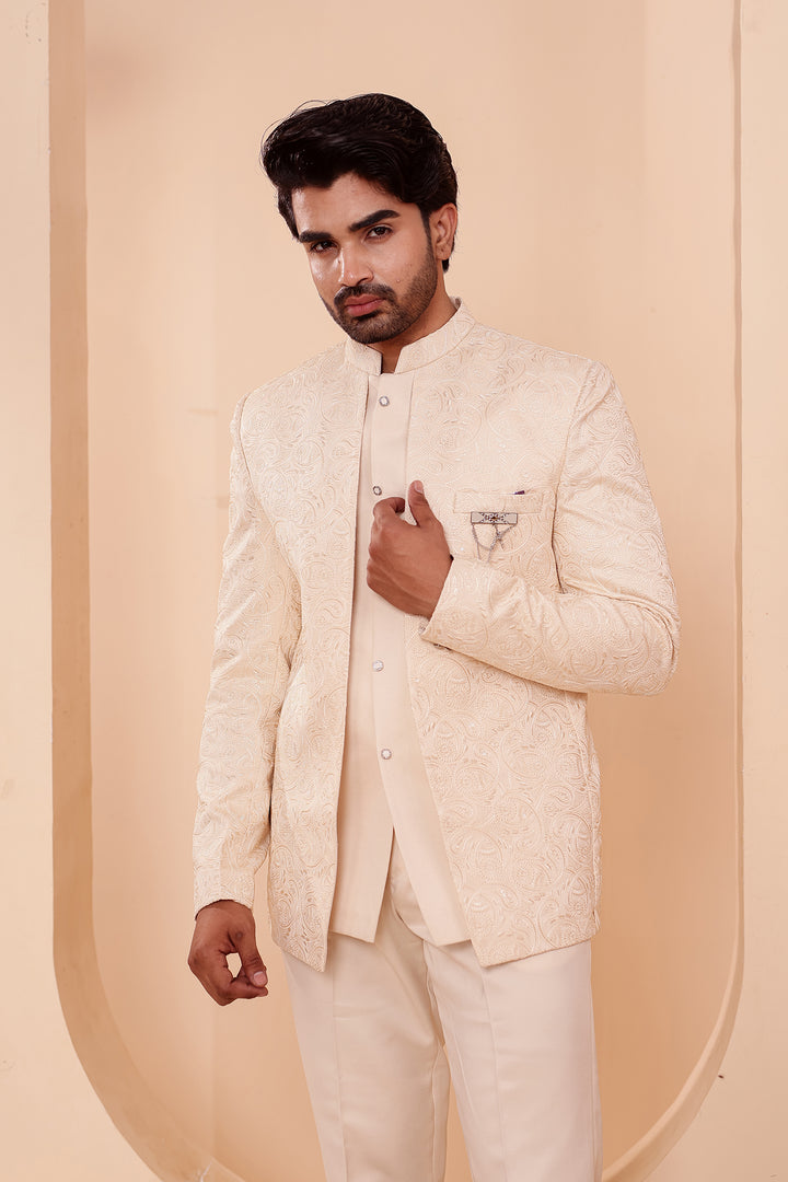 Cream Heavy Embroidered 3pcs Jacket Style Jodhpuri Suit.