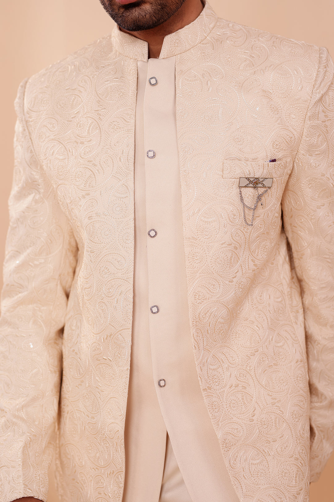Cream Heavy Embroidered 3pcs Jacket Style Jodhpuri Suit.