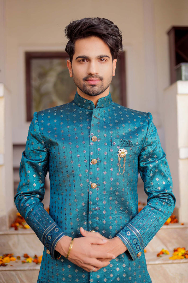 Teal Raw Silk Indo-Western Suit Embroidered With Gold Sequin And Resham Thread.