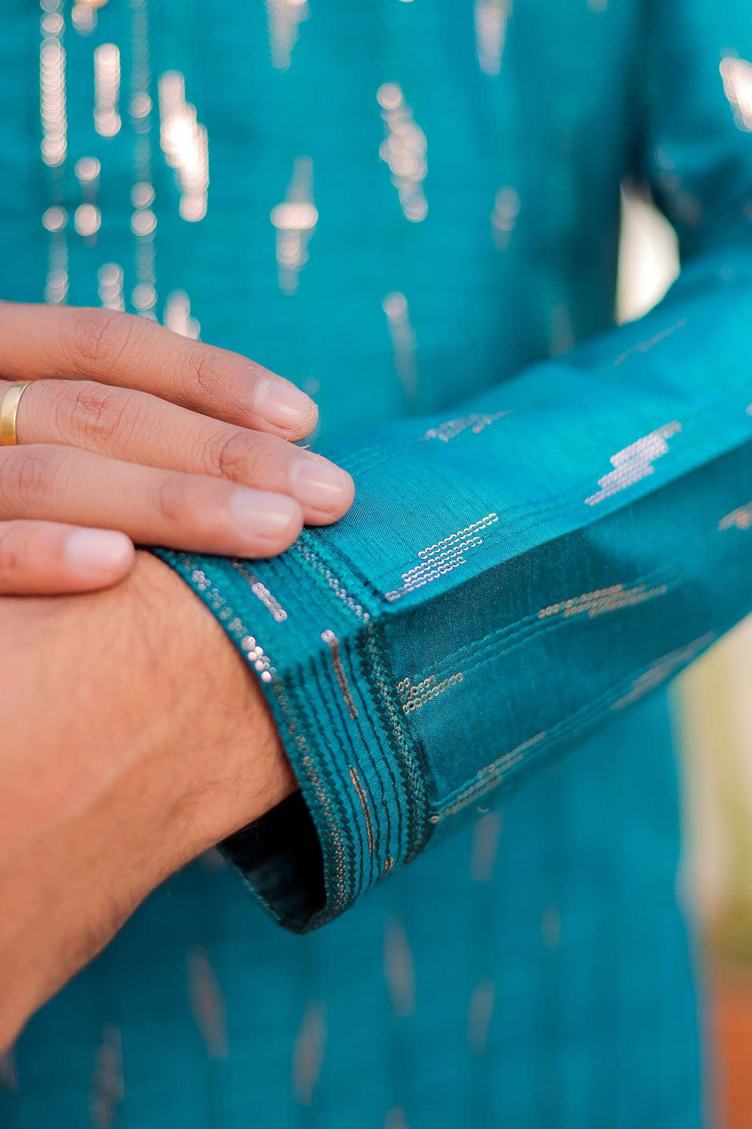 Teal Raw Silk Kurta Suit With Sequin Embroidery All Over.