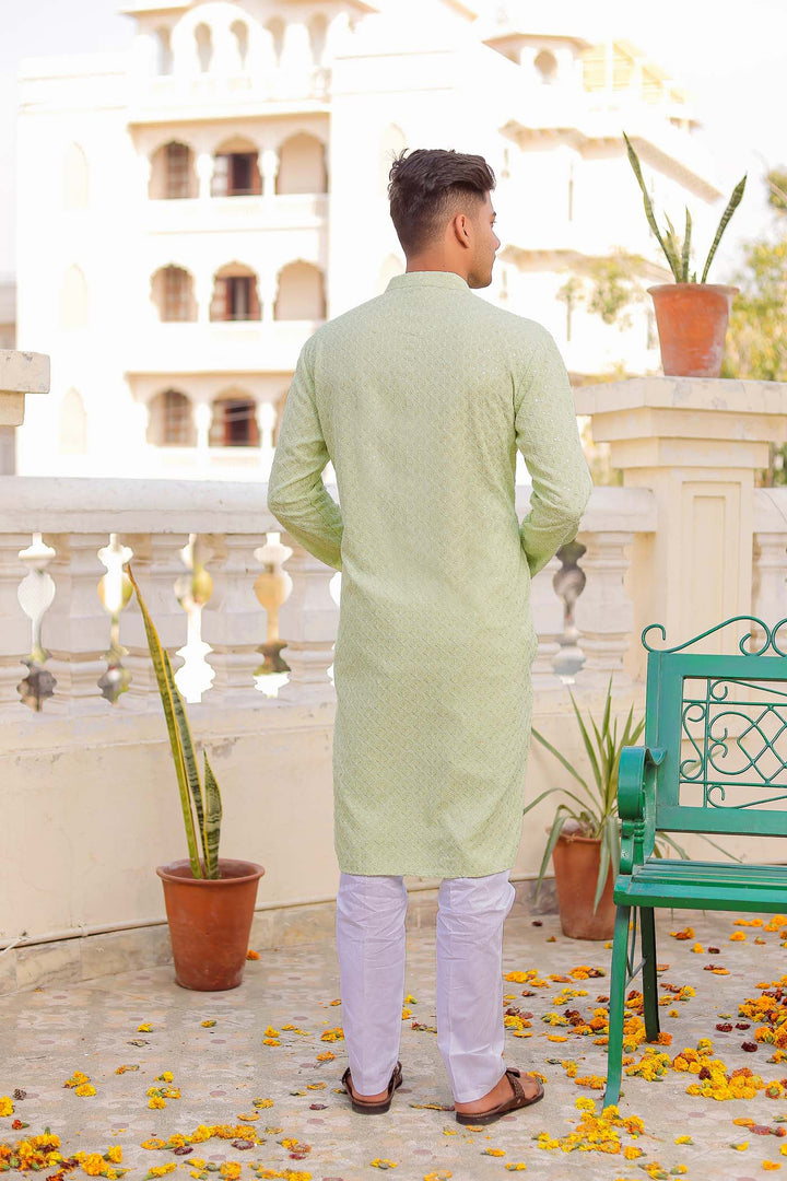 Pista Sequin Embellished Chikankari Kurta Suit.