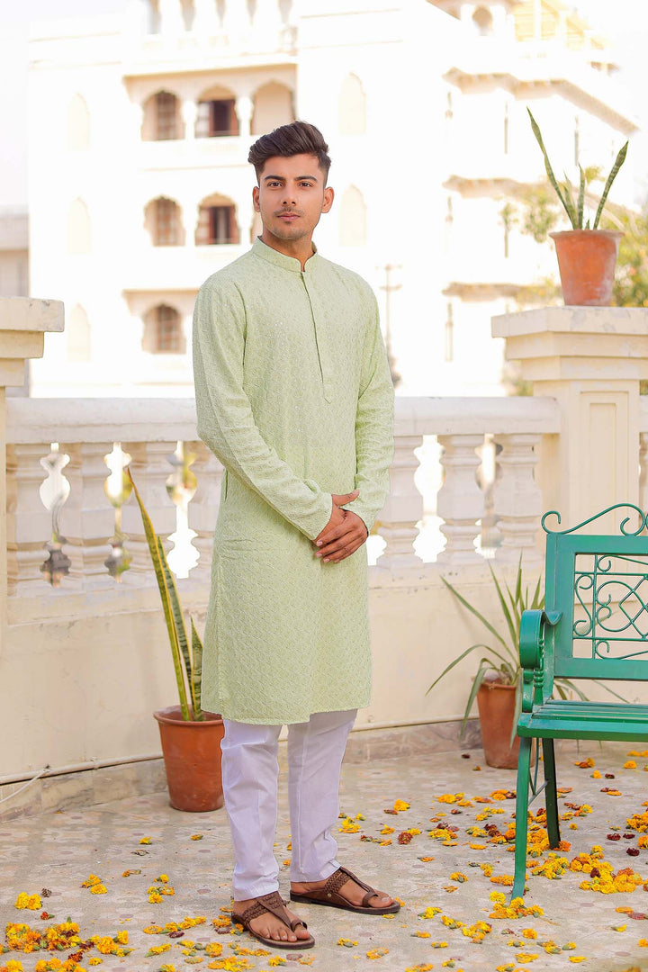 Pista Sequin Embellished Chikankari Kurta Suit.