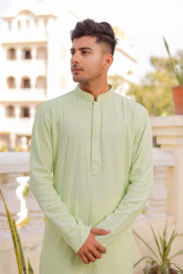 Pista Sequin Embellished Chikankari Kurta Suit.