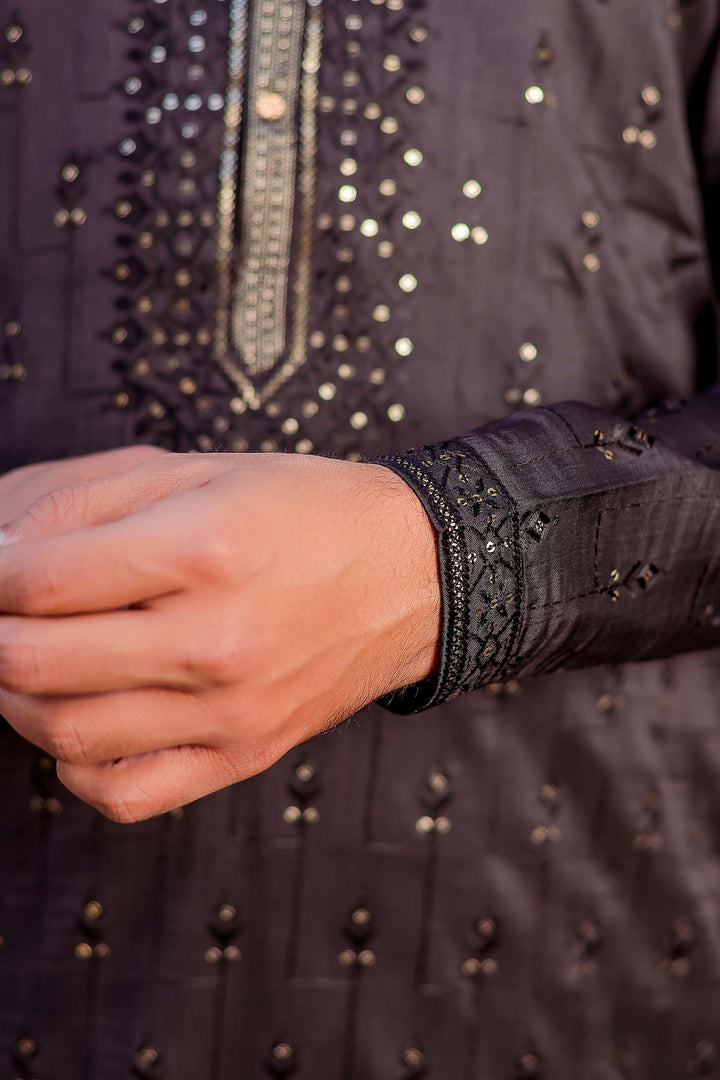 Black Raw Silk Kurta Suit With Resham Thread And Sequin Embroidery.