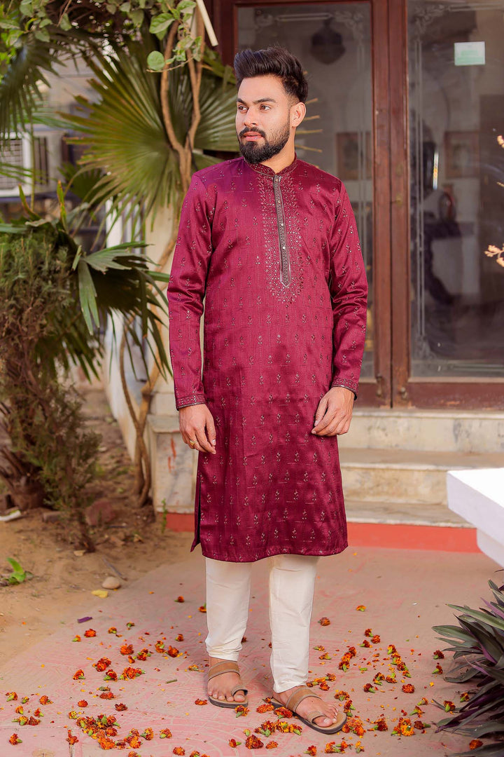 Wine Raw Silk Kurta Suit With Resham Thread And Sequin Embroidery.