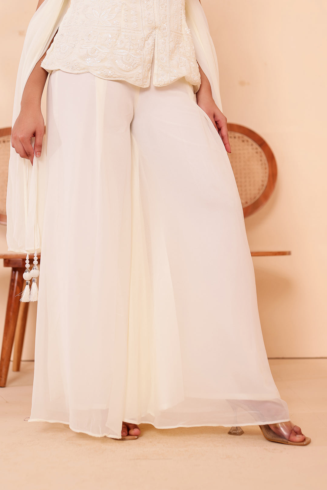Off White Indo-western Style with Flared Palazzo Suit.