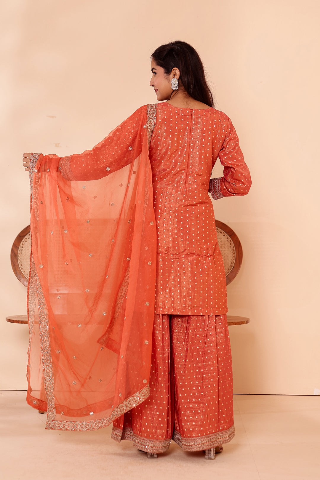Rust Shimer Butti Sharara Suit.
