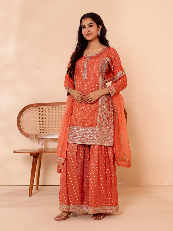 Rust Shimer Butti Sharara Suit.