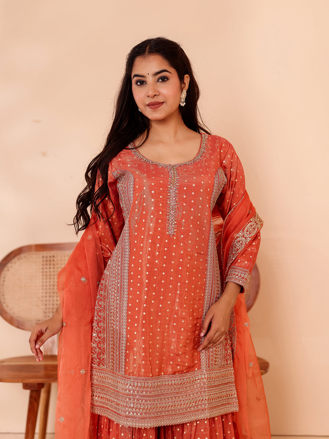 Rust Shimer Butti Sharara Suit.