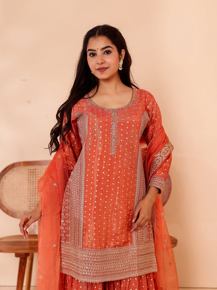Rust Shimer Butti Sharara Suit.