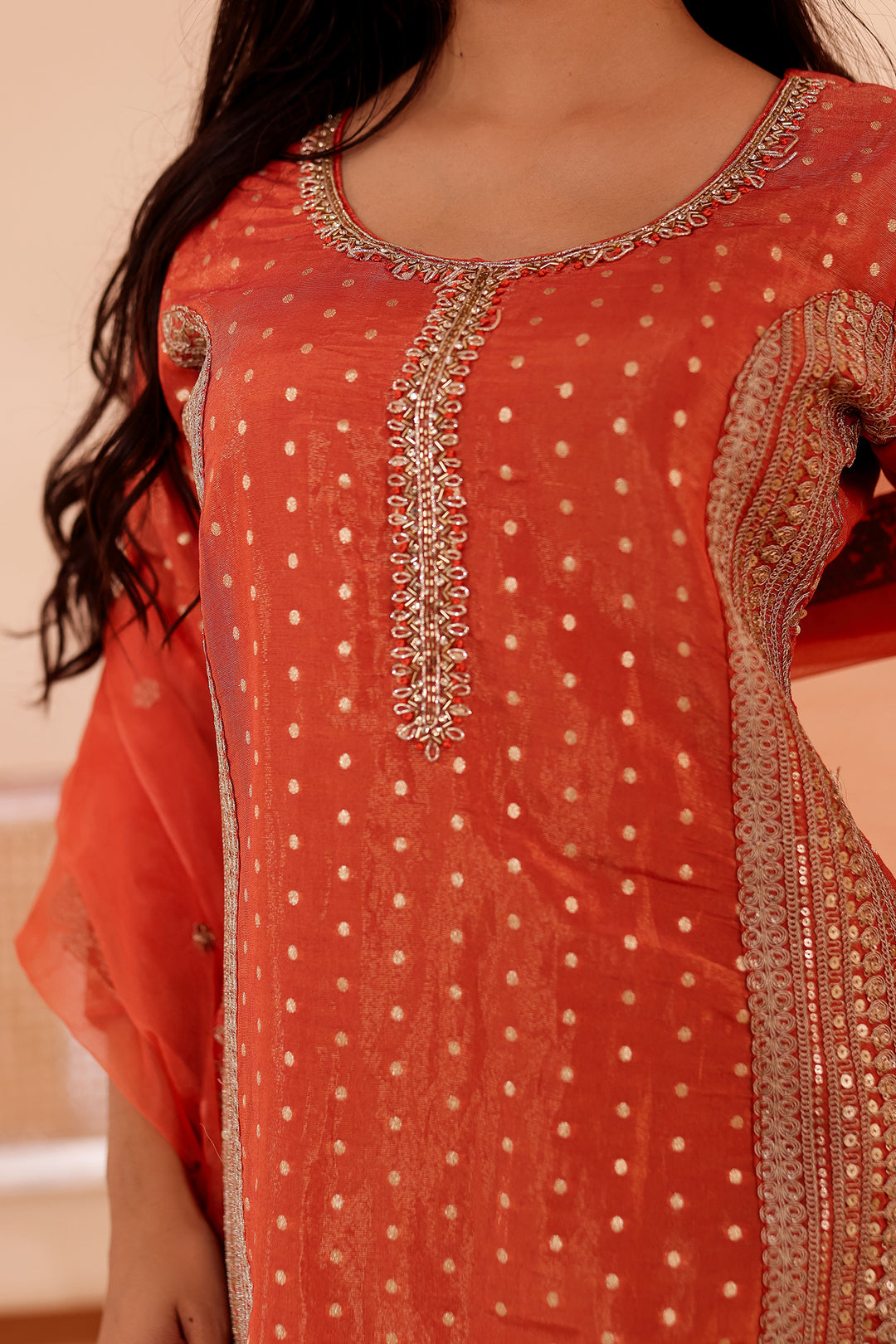Rust Shimer Butti Sharara Suit.
