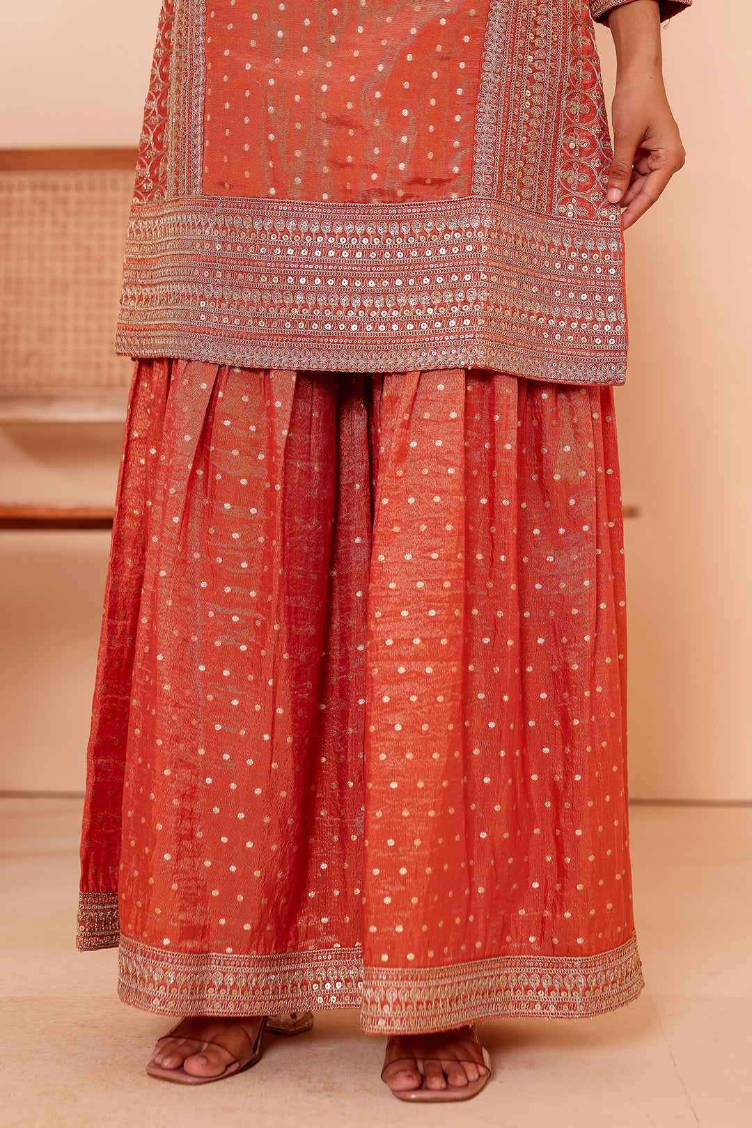 Rust Shimer Butti Sharara Suit.