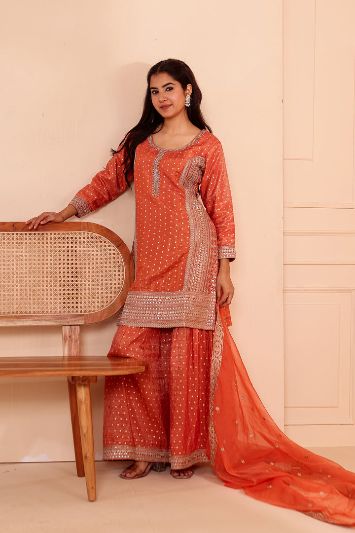 Rust Shimer Butti Sharara Suit.