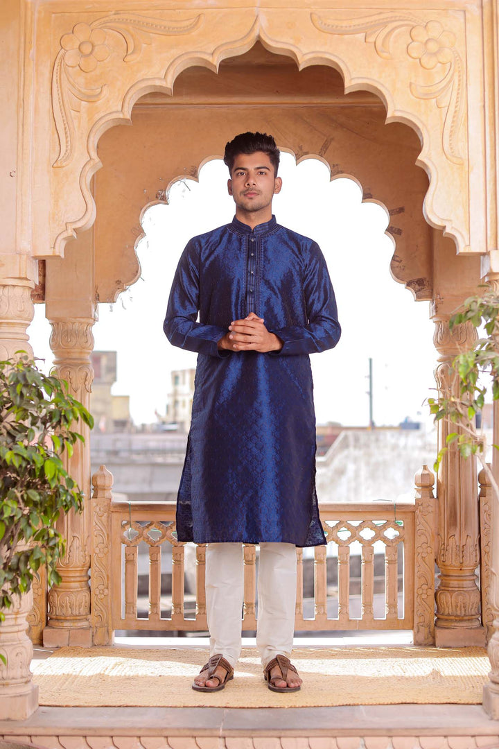 Midnight Blue Brocade Silk Kurta Suit With Delicate Dori Work On The Neckline.