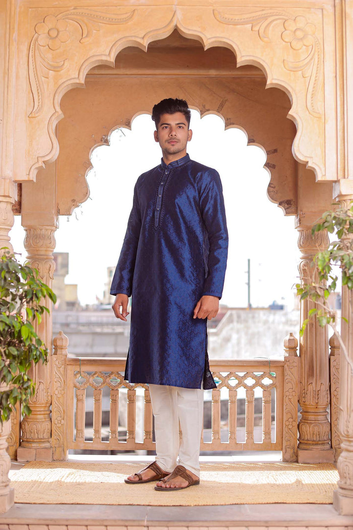 Midnight Blue Brocade Silk Kurta Suit With Delicate Dori Work On The Neckline.