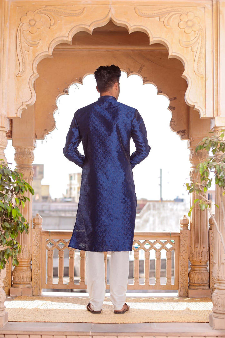 Midnight Blue Brocade Silk Kurta Suit With Delicate Dori Work On The Neckline.