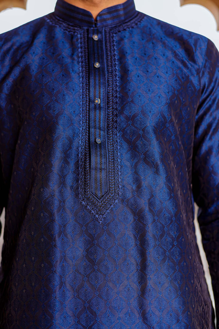 Midnight Blue Brocade Silk Kurta Suit With Delicate Dori Work On The Neckline.