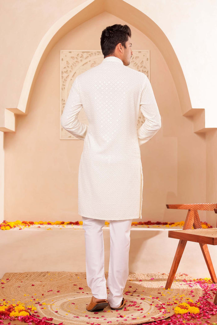 Ivory Chikankari Embroidered Kurta Suit.