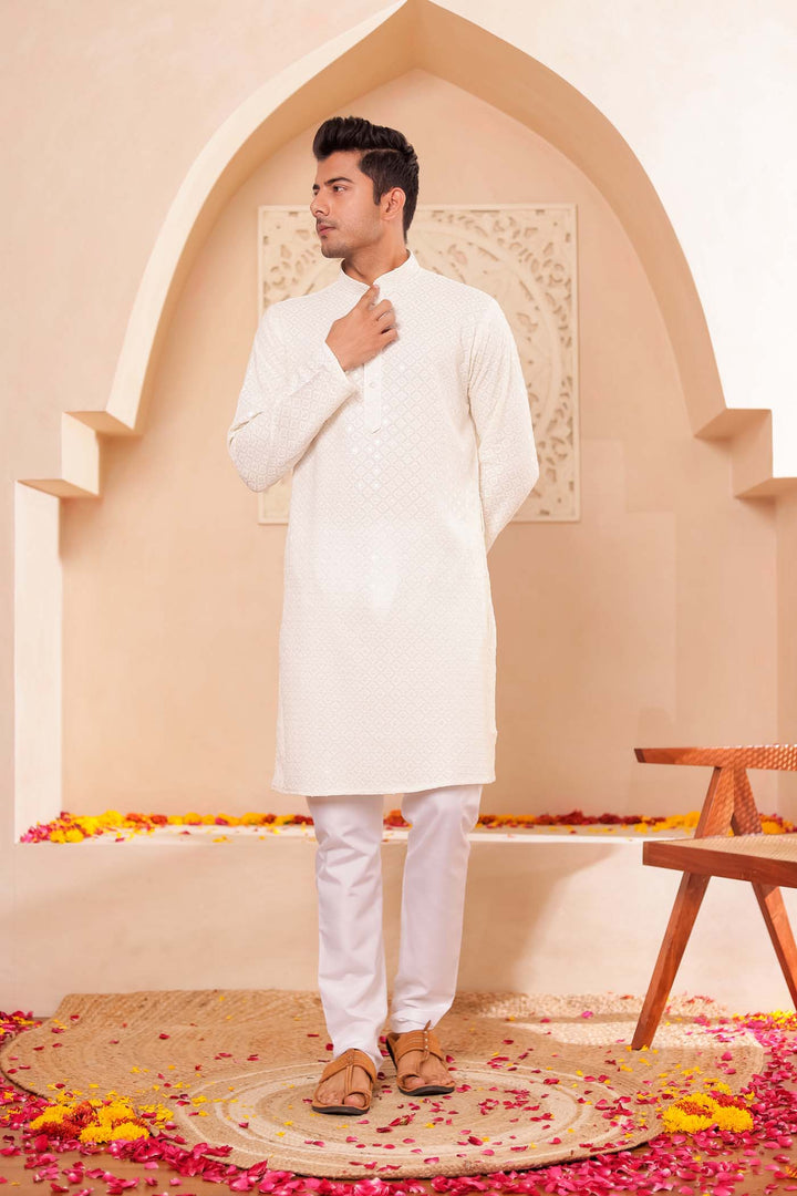 Ivory Chikankari Embroidered Kurta Suit.